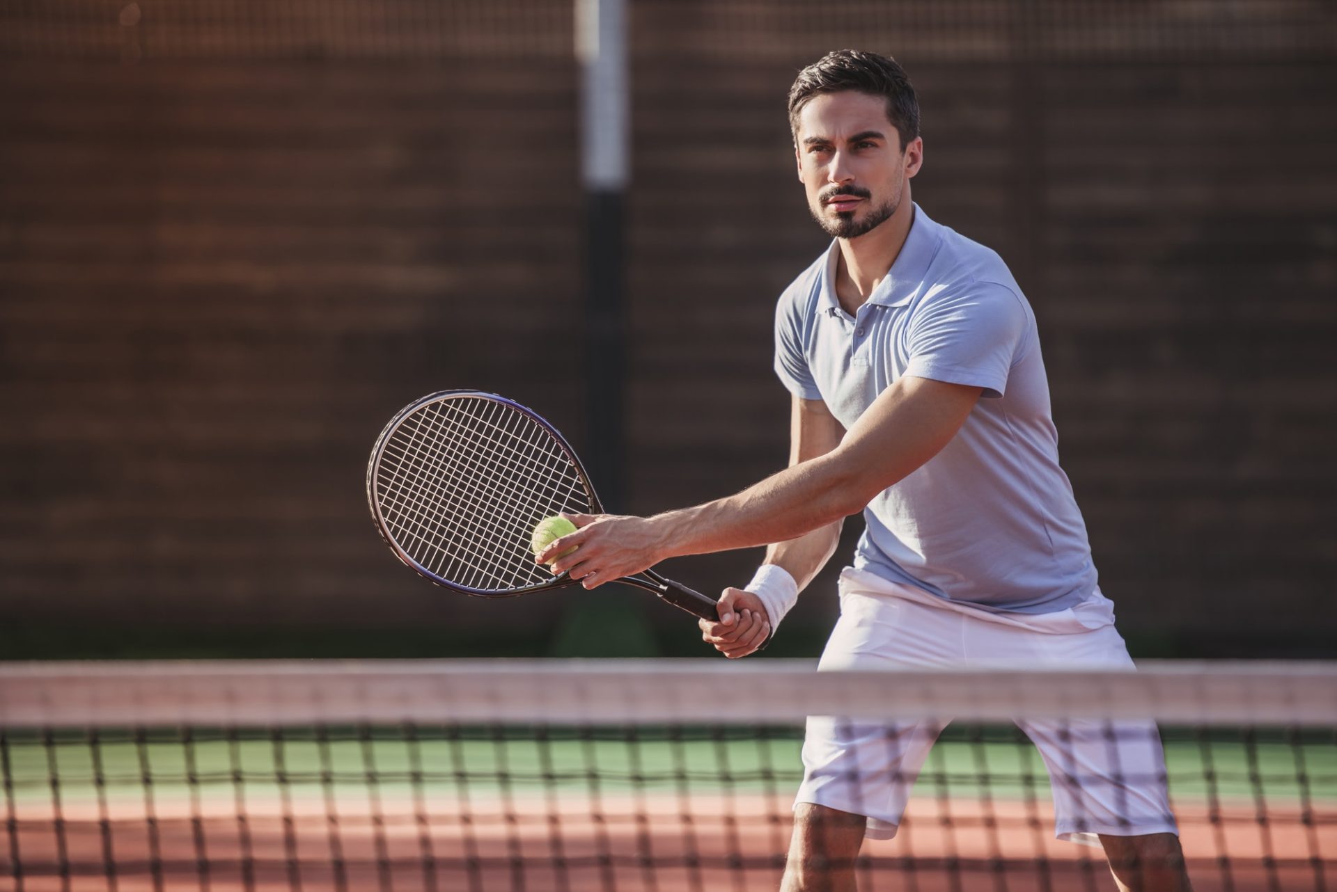 Man playing tennis
